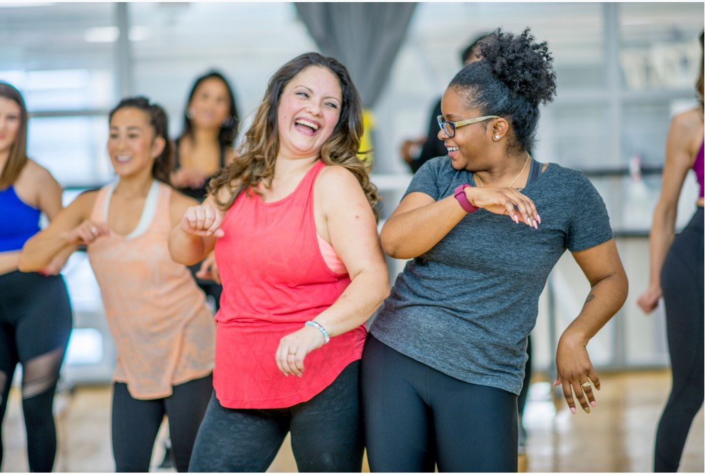 Two women dancing in a Zumba class